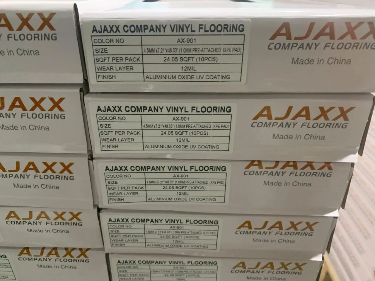 AJAXX flooring product boxes from the client archive
