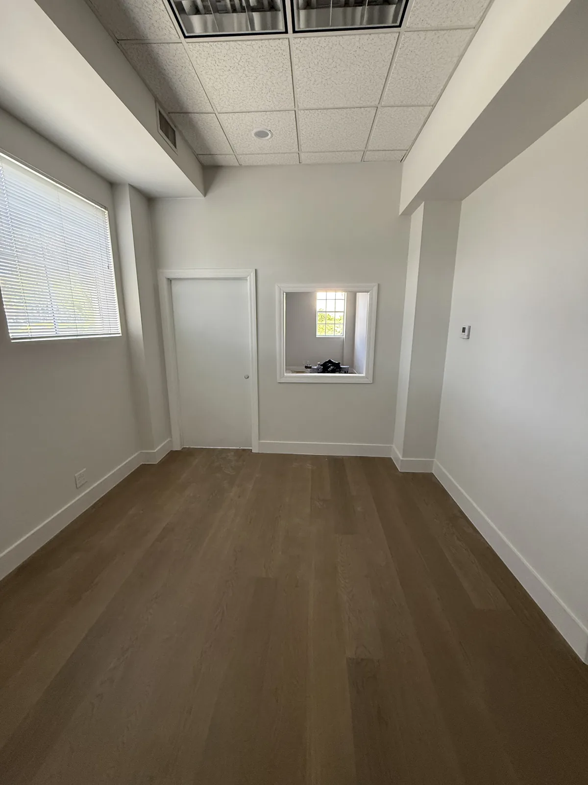 Finished Boca Raton office with wood-look flooring