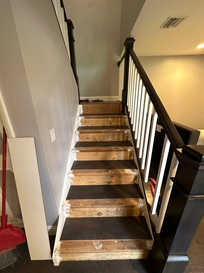 Stair treads in place while the riser details remain in progress