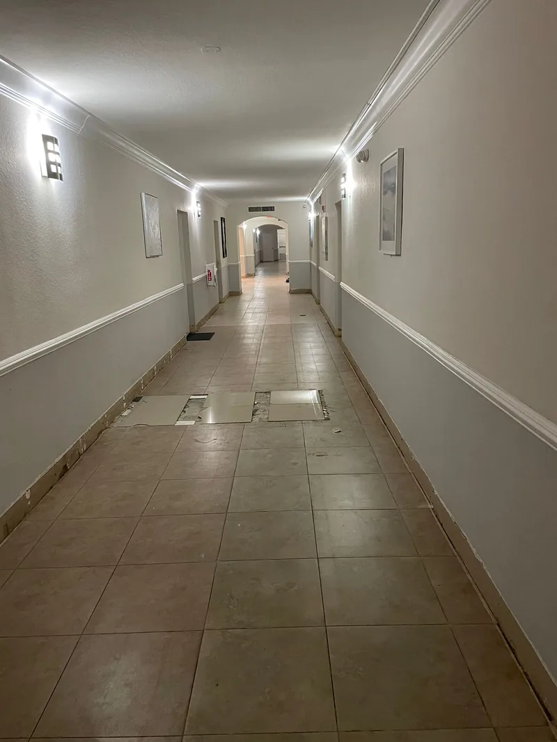 Long corridor documented during floor preparation