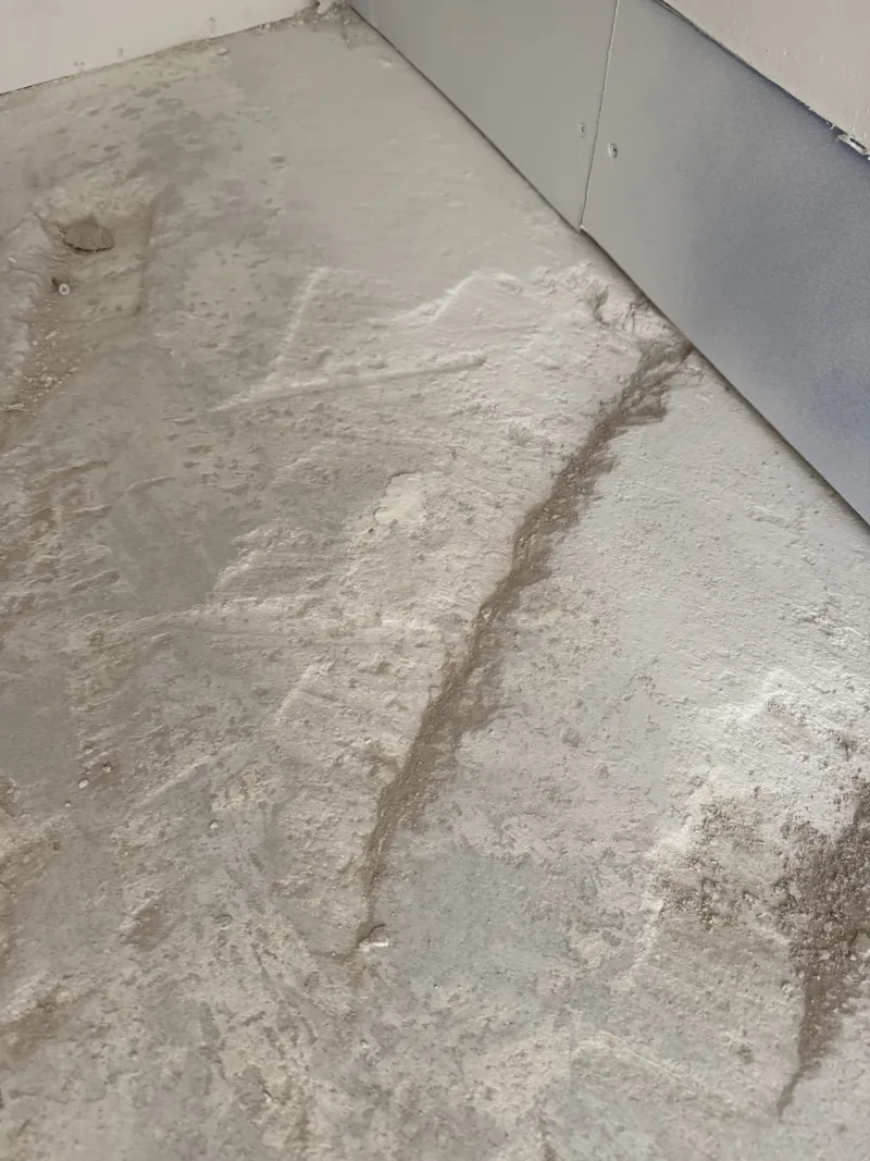 Prepared base with visible leveling marks during review