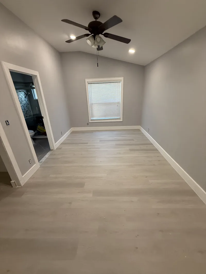 Completed bedroom with light flooring