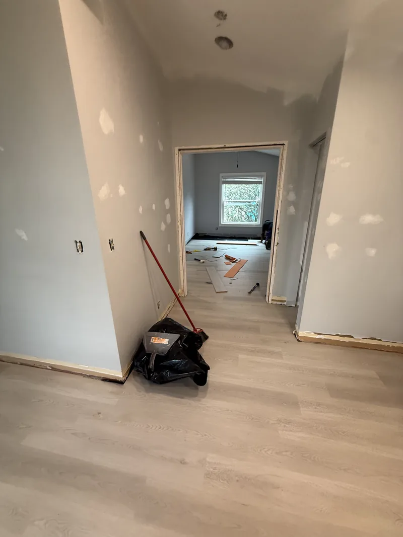 Finished corridor with light flooring