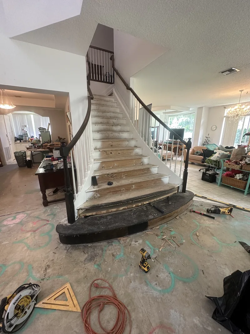 Curved staircase after the old surface was removed