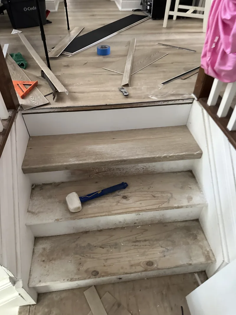Stair angles documented while the flooring work remains in progress