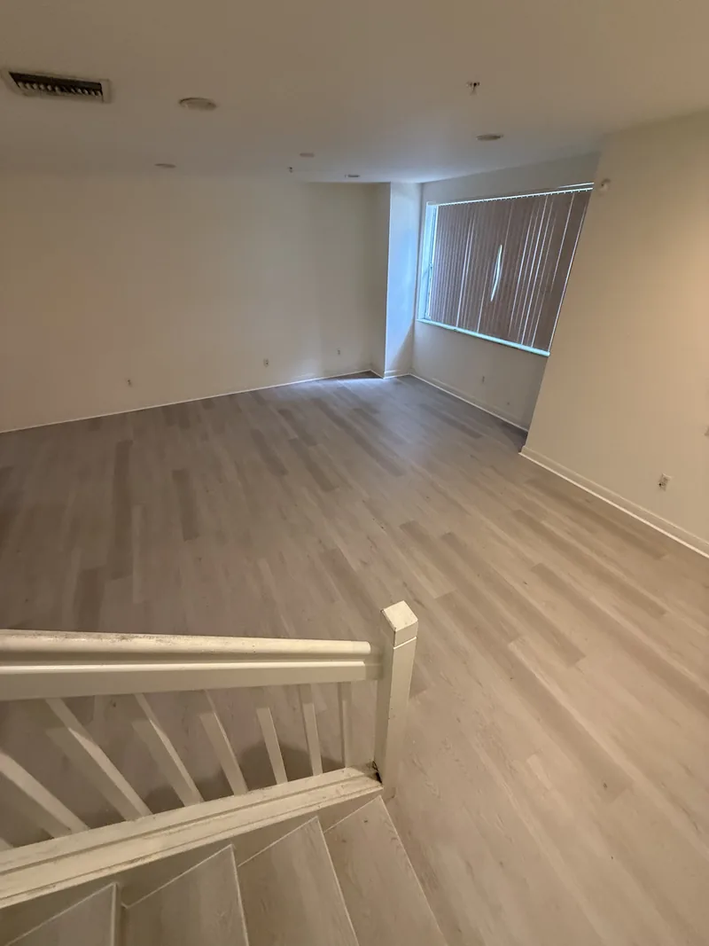 Finished room with light flooring and an open doorway